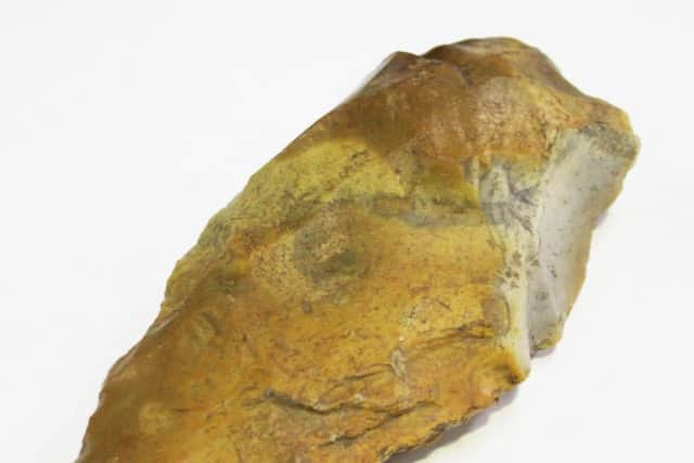 A Palaeolithic flint stone hand axe found near West Dean in West Sussex.