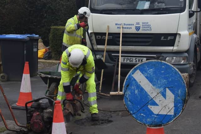 One of West Sussex County Council's pothole repair teams