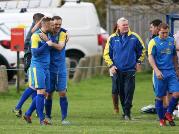 Stephen Kirkham celebrates his goal in Rustington's win over second-placed Alfold on Saturday. Picture by Derek Martin