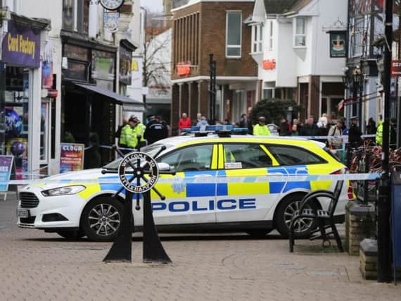 High Street, Littlehampton, was cordoned off after the stabbings. Picture: Eddie Mitchell