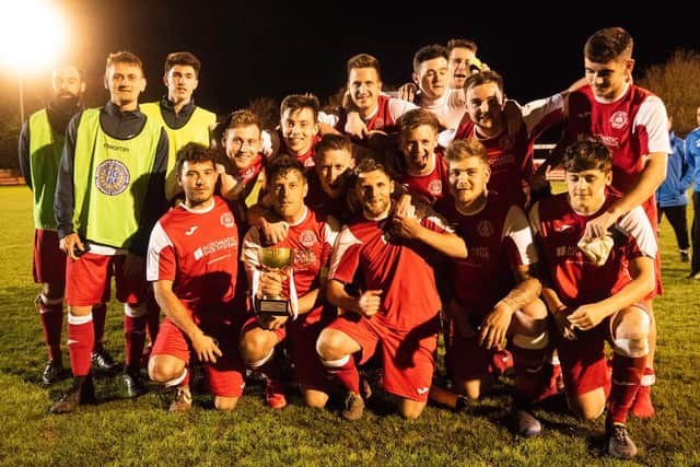 Bosham with the cup / Picture by Tommy McMillan