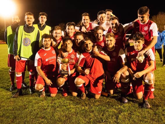 Bosham with the cup / Picture by Tommy McMillan