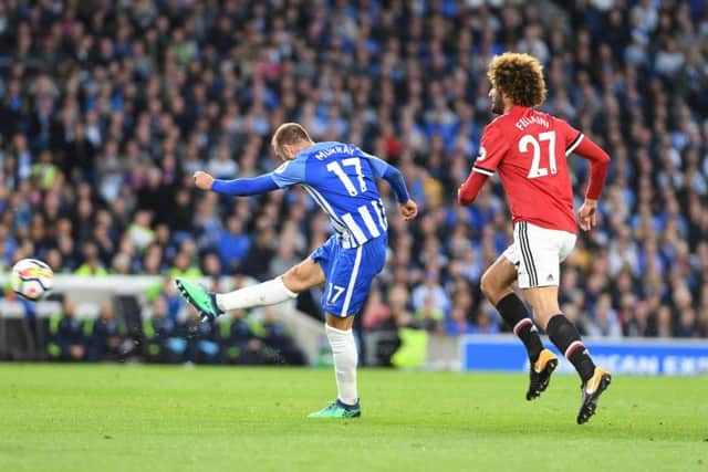 Glenn Murray lets fly with an effort from 25 yard against Manchester United. Picture by PW Sporting Photography