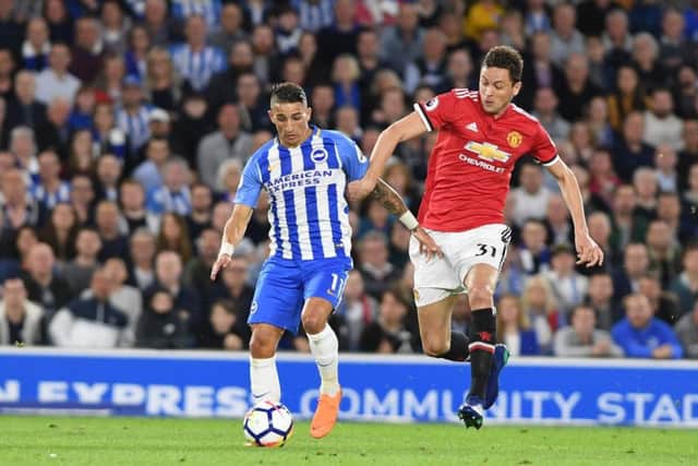 Brighton's Anthony Knockaert and United's Nemanja Matic battle for the ball. Picture by PW Sporting Photography