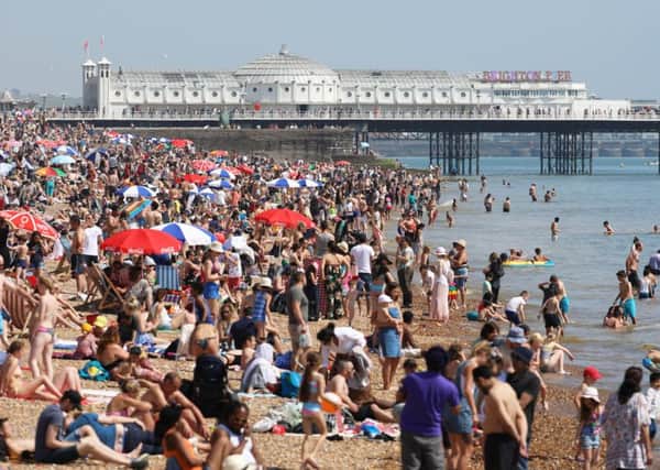 Thousands enjoy the sun at Brighton beach