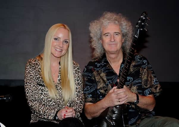 Brian May with Kerry Ellis pictured on a visit to the Hawth Theatre in Crawley in 2012