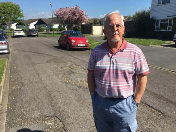 Dave Richardson, 70, from Fishers Close in Littlehampton, is calling on his road to be resurfaced