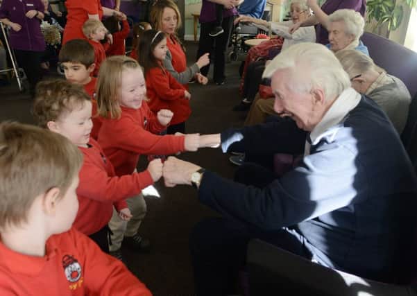 Busy Bees children enjoying themselves with Augusta Court residents. All pictures Kate Shemilt ks180122-7
