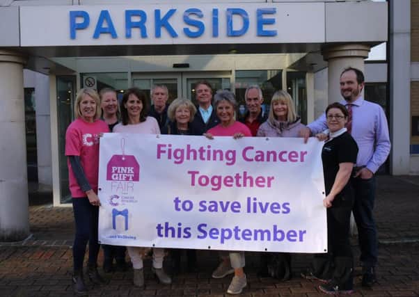 Volunteers getting ready to fight cancer this September, joined by Sarah Dover-McCarthy of Total Therapy and Blaise Tapp of ETC magazine and West Sussex County Times SUS-180515-101751001