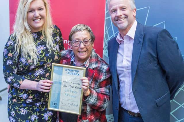 Molly Masters with Mayor Mo Marsh and Peter Lane of Sussex Innovation