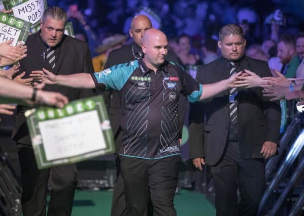 Rob Cross makes his way to the stage in Aberdeen last night. Picture courtesy Steve Welsh/PDC