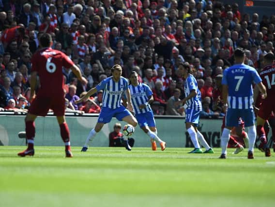 Liverpool v Brighton & Hove Albion. Dale Stephens on the ball. Pictures by PW Sporting Photography