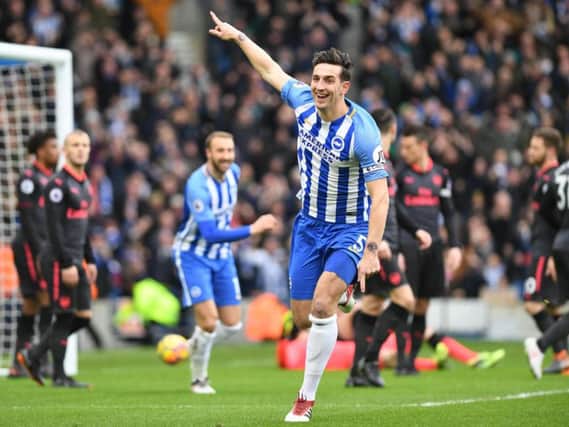 Lewis Dunk celebrates scoring against Arsenal. Picture by Phil Westlake (PW Sporting Photography)
