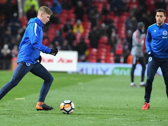 Max Sanders warms up at Old Trafford before Albion's FA Cup tie at Manchester United. Picture by Phil Westlake (PW Sporting Photography)