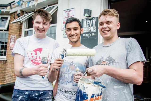 The Bevy's rugby volunteers, from the left William Strachan, Nirav Patel, Dom Smith