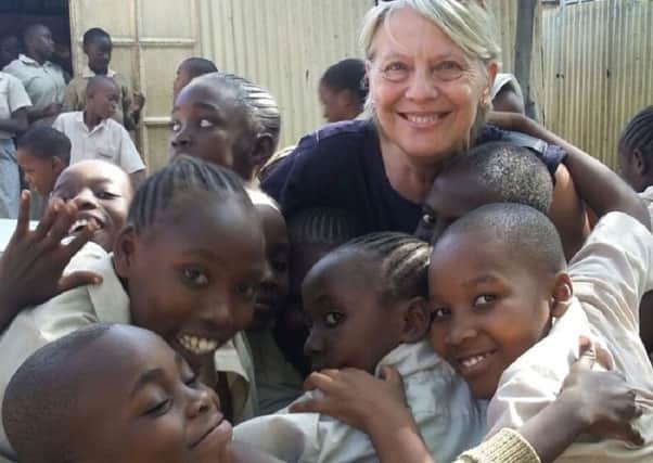 Carol Groves with the Kenyan children at Unity School in Mombasa