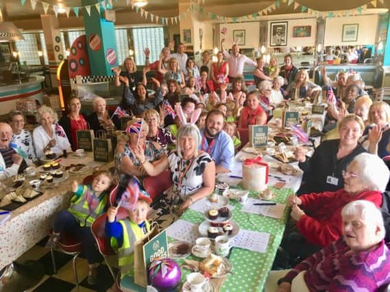 Young people and older residents were brought together by The Body Shop team in Littlehampton for a royal wedding party