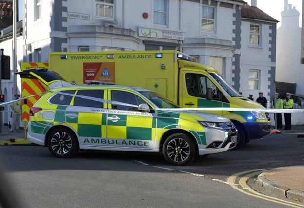 Paramedics and Police attend to a person seriously injured in Langney Road, Eastbourne (Photo by Jon Rigby) SUS-180505-185210008