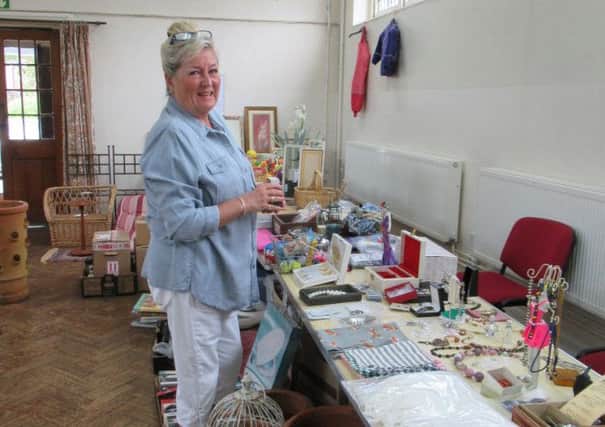 Elaine Nash running the bric-a-brac stall at the coffee and doughnut morning held by the East Preston and Kingston Horticultural Society
