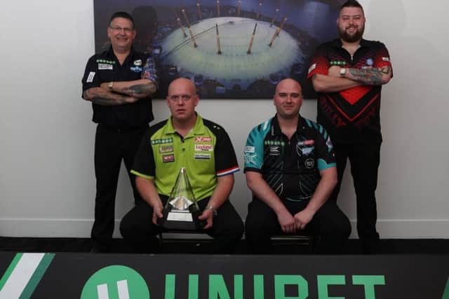The four men who will contest the Unibet Premier League Play-Offs at The O2 tonight. From left: Gary Anderson, Michael van Gerwen, Rob Cross and Michael Smith. Picture courtesy Lawrence Lustig/PDC