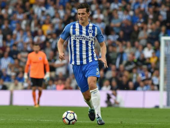 Lewis Dunk in action for Brighton & Hove Albion. Picture by PW Sporting Photography