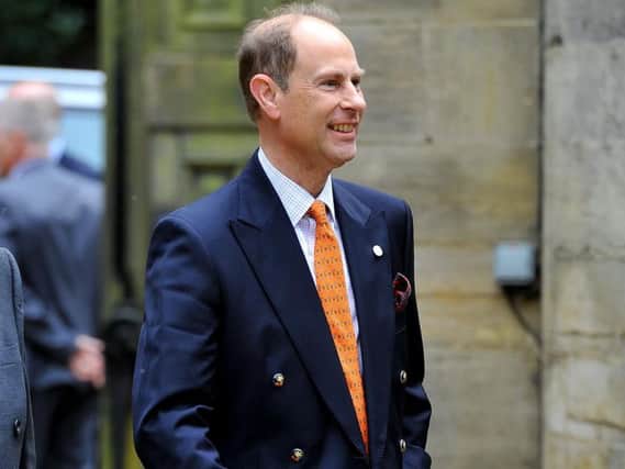Prince Edward visits Petworth House Tennis Court. Photo by Steve Robards