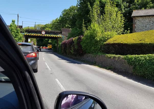 Queueing traffic along the B2139 in Amberley