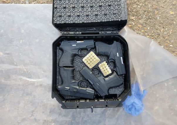 Five handguns and three hand grenades have been seized following a NCA operation at Rosier Business Park in Billingshurst. Picture: NCA