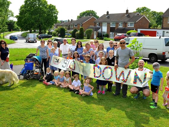 Campaigners are battling for a new crossing to be created along a busy Horsham road