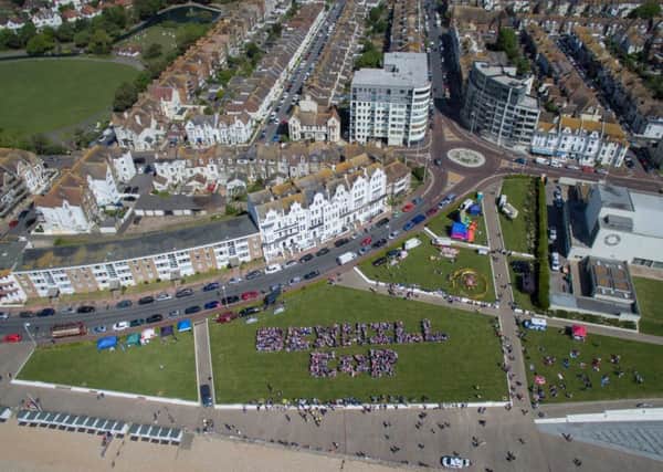 Around 800 people formed 'Bexhill ER' on the seafront lawns