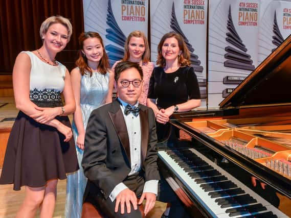 SIPC Winner Yi-Yang Chen at the piano, with fellow finalists and past winners (pic Andrew Mardell)