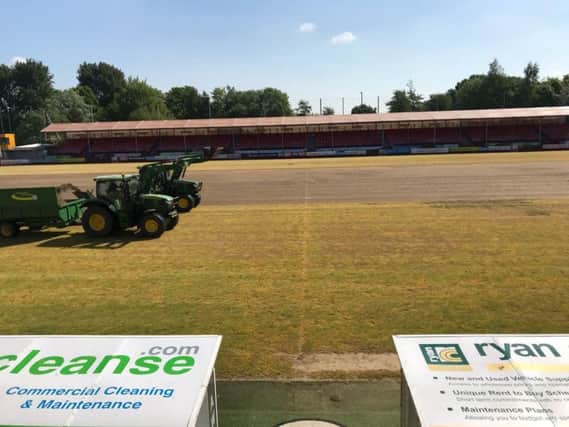 Work starts on the pitch. Picture courtesy of Crawley Town