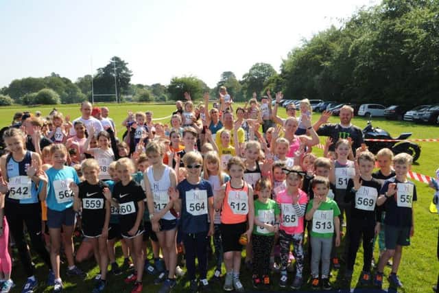 Junior runners ready at the start of the under-16's race. Picture by Jon Rigby