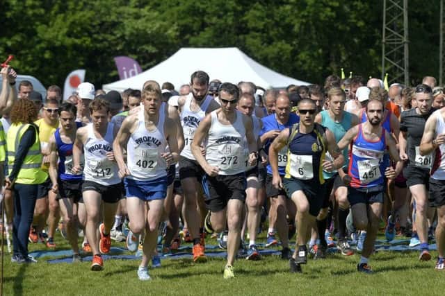 Runners get underway at the annual Horsham 10k. Picture by Jon Rigby