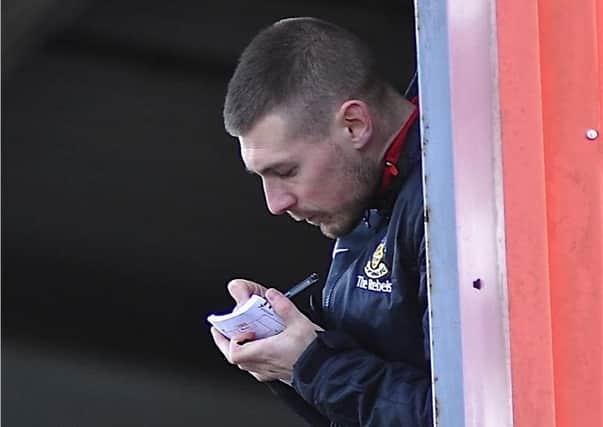 Jon Meeney watches on from the stands during his time at Worthing. Picture by Stephen Goodger