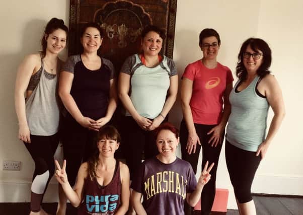 Andria Degen's Yoga class supporting Therapy Month SUS-180525-120449001