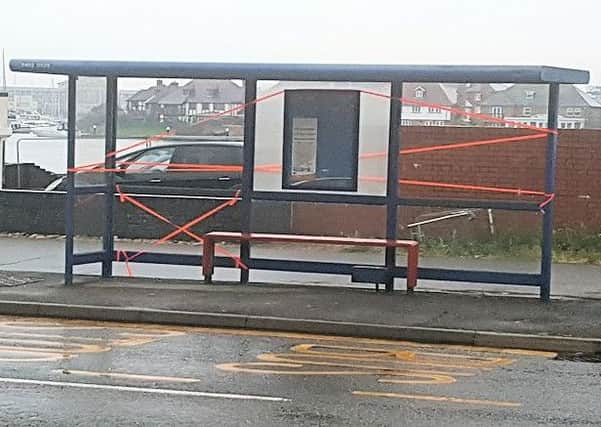 Bus shelter damage. Image provided by Sussex Police