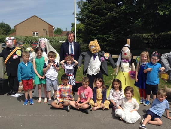 Henry Smith MP with children at The Brook School