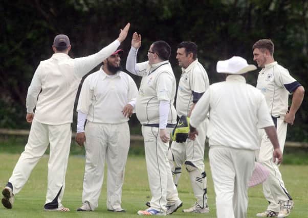 Selsey celebrate a wicket in a recent clash with Aldwick / Picture by Kate Shemilt