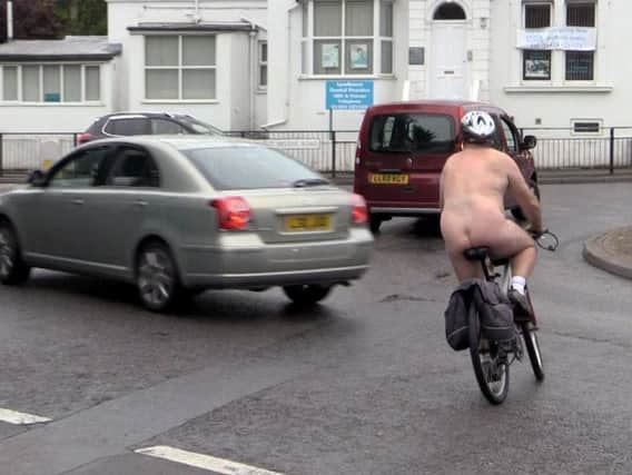 A cyclist taking part in the Hastings World Naked Bike Ride in 2015.