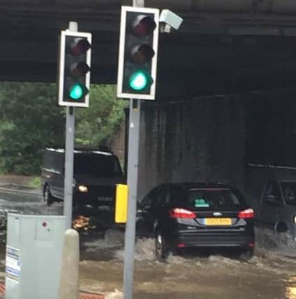 Flooding under the railway bridge near Haywards Heath railway station. Picture: Claire Barber