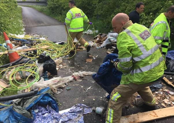Firefighters had to clear the emergency route themselves. Picture: WSFRS