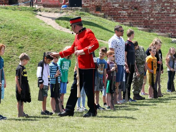 Friends of Shoreham Fort chairman Gary Baines leads the parade drill. Picture: Derek Martin DM1860184a