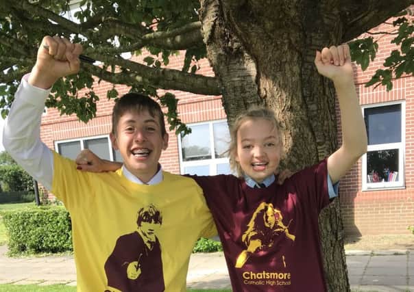 Magic: Chatsmore Catholic High School pupils Ben Moore and Sophie Scott sporting their Ron and Hermione t-shirts in support of their school's chosen characters SUS-180706-114031001