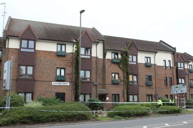 Police taped off flats in Park Way as they investigated the incident last year