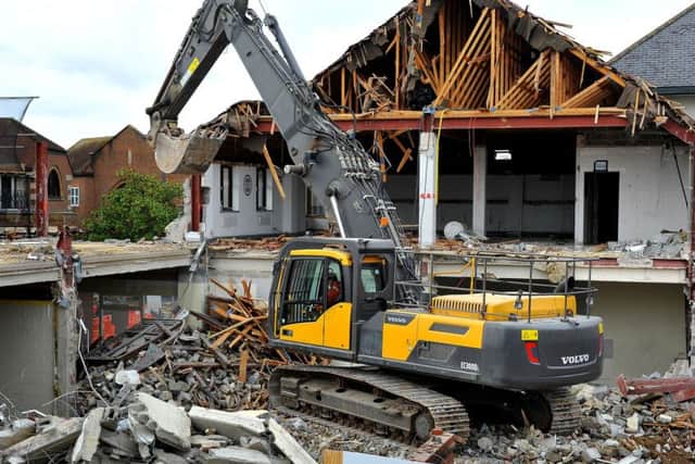 Demolition he started on the old Waitrose building, Piries Place Horsham. Pic Steve Robards SR1728609 SUS-171127-155253001