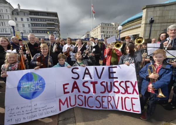 Alan Thomas and many other musicians at Eastbourne Bandstand protesting about the cuts to East Sussex Music Service (Photo by Jon Rigby)