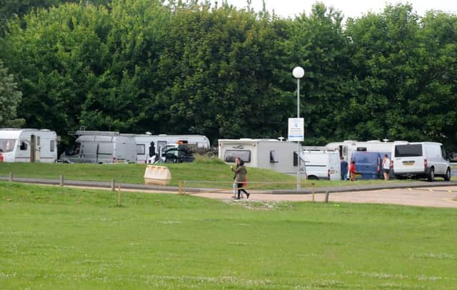 Travellers on the grounds next to Sussex Downs College (Photo by Jon Rigby) SUS-180706-101523008