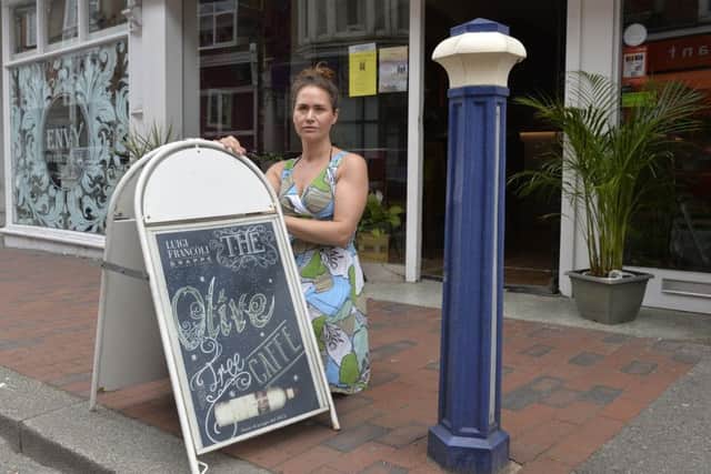 Joanna Cavaliere outside her Olive Tree Caffe in Grove Road, Eastbourne (Photo by Jon Rigby)