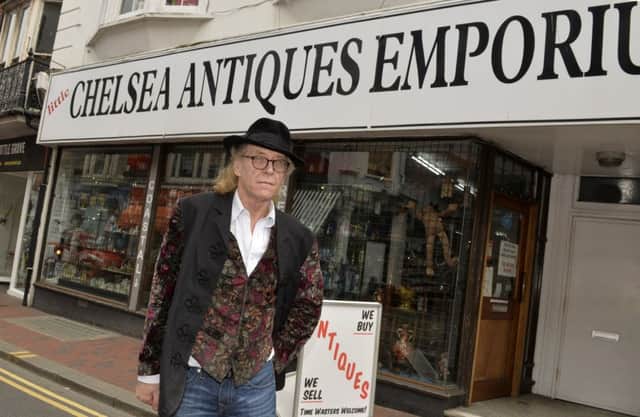 Steve Hansen outside his shop Little Chelsea Antiques Emporium in Grove Road, Eastbourne (Photo by Jon Rigby)